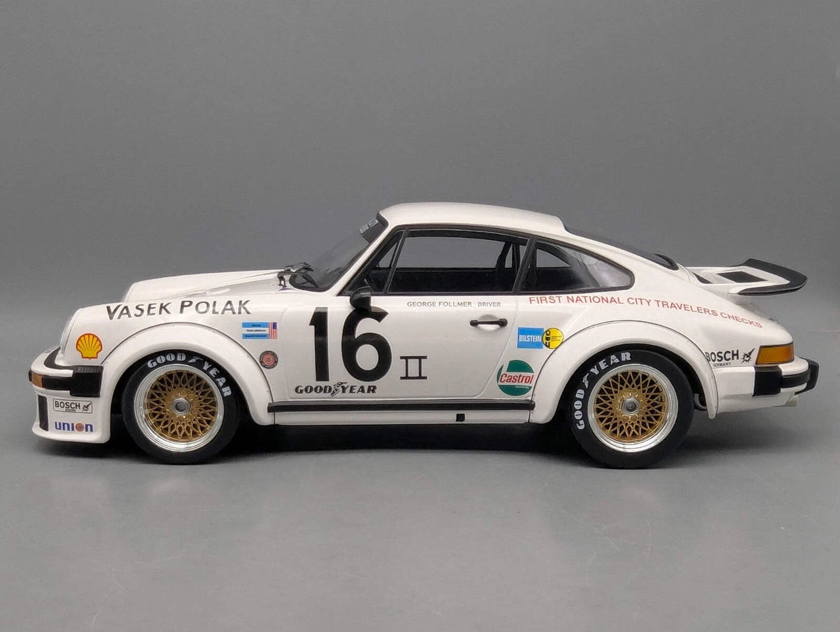 Modellautos 1:12 Minichamps Porsche 934 RSR Turbo WINNER 76 #16. Follmer Vitrine