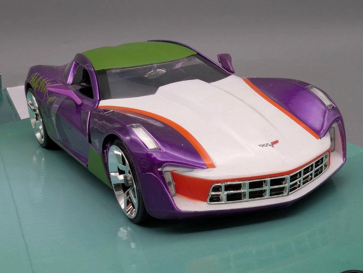 Modellautos 1:24 Jada 2009 Chevrolet Chevy Corvette Stingray "Joker's Car" OVP