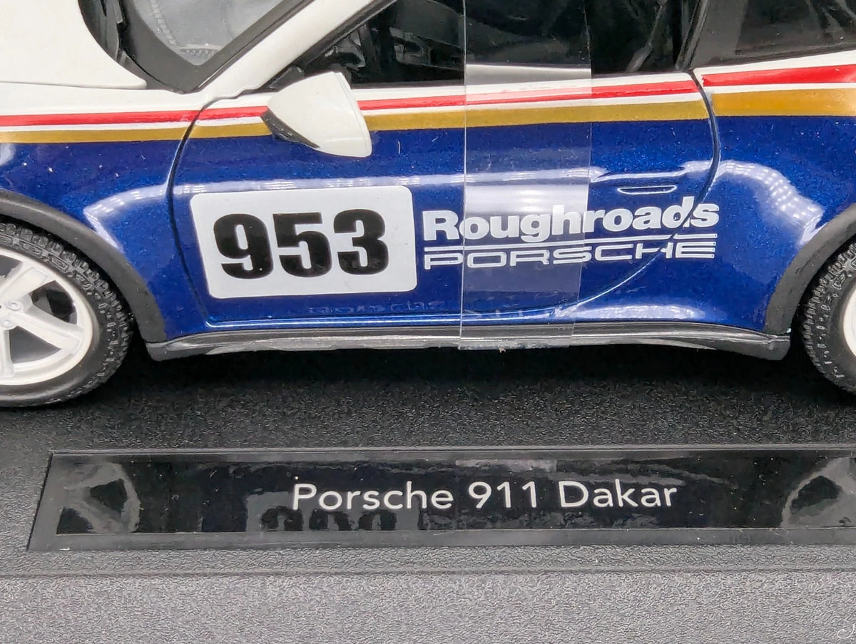 Modellautos 1:24 Bburago Porsche 911 Dakar mit Dealer OVP