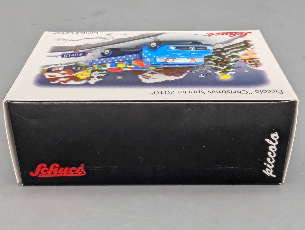 Modellautos 1:90 Schuco Piccolo Christmas Special Weihnachten 2010 MB LKW in OVP