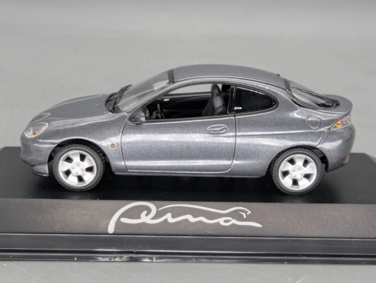 Modellautos 1:43 Minichamps Ford Puma Silbergrau Metallic mit Dealer OVP