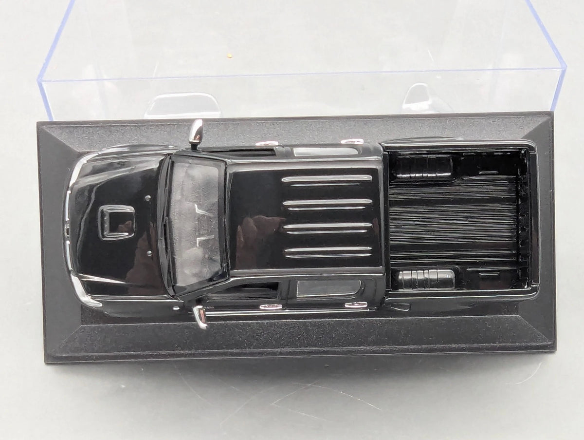 Modellautos 1:43 Minichamps Toyota Hillux Schwarz mit OVP