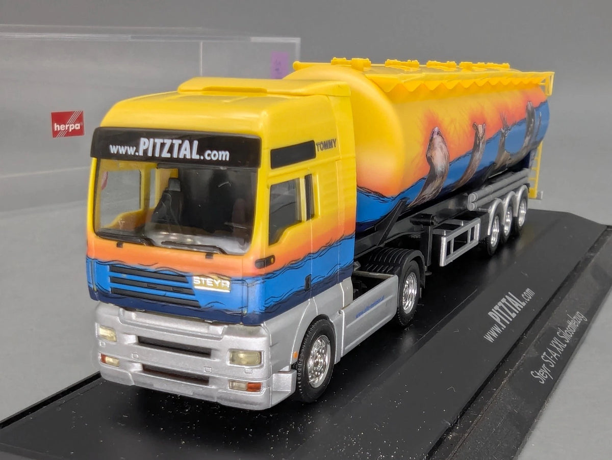 Lkw Modell 1:87 Herpa Steyr ST-A XXL Silosattelzug Pitztal mit Vitrine