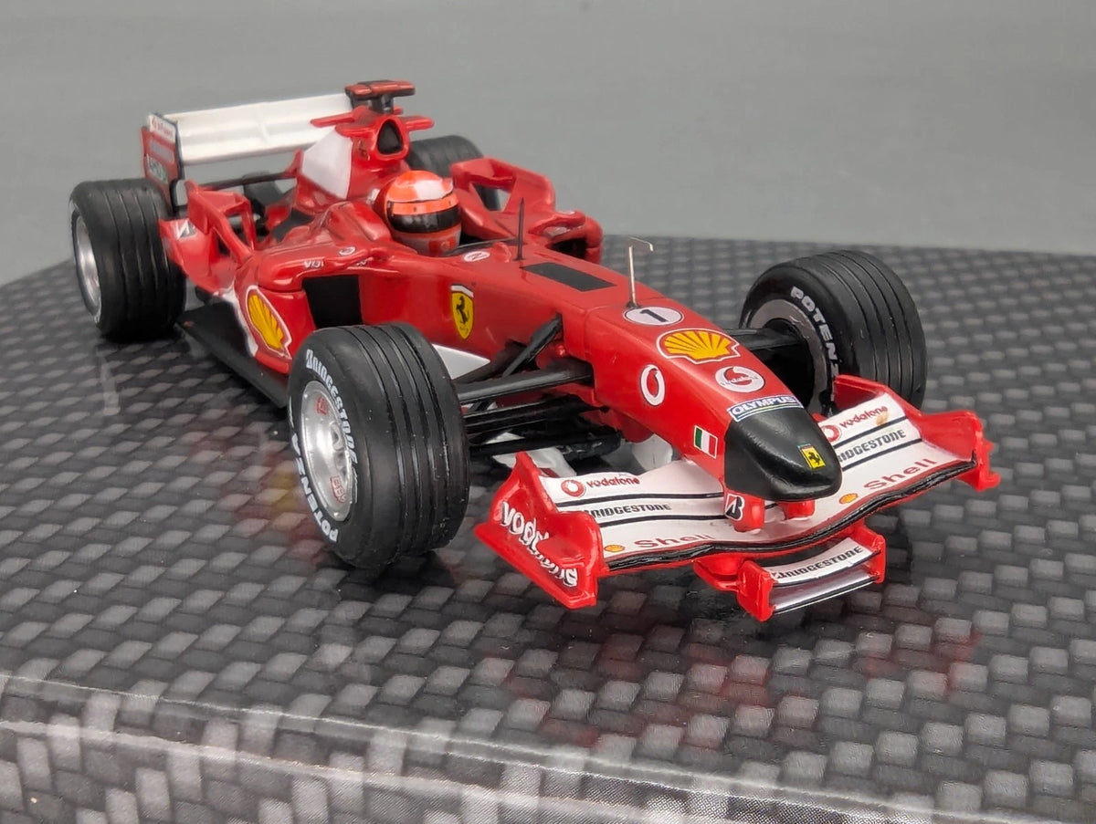 Modellautos 1:43 Ixo Ferrari F2005 #1 Michael Schumacher mit Klappbox OVP