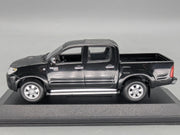 Modellautos 1:43 Minichamps Toyota Hillux Schwarz mit OVP