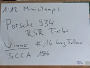 Modellautos 1:12 Minichamps Porsche 934 RSR Turbo WINNER 76 #16. Follmer Vitrine