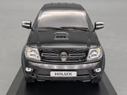 Modellautos 1:43 Minichamps Toyota Hillux Schwarz mit OVP