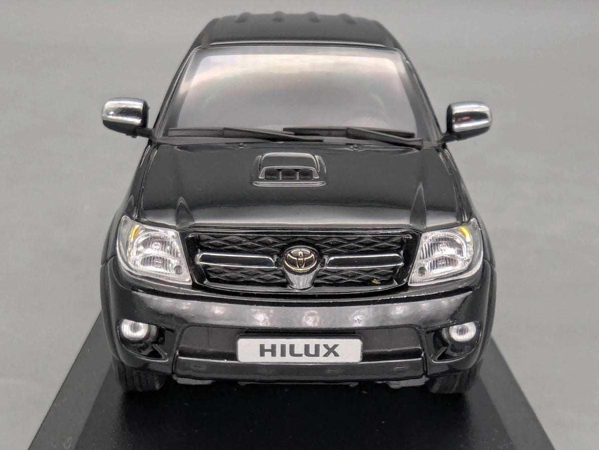 Modellautos 1:43 Minichamps Toyota Hillux Schwarz mit OVP
