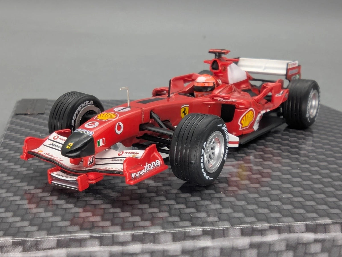 Modellautos 1:43 Ixo Ferrari F2005 #1 Michael Schumacher mit Klappbox OVP