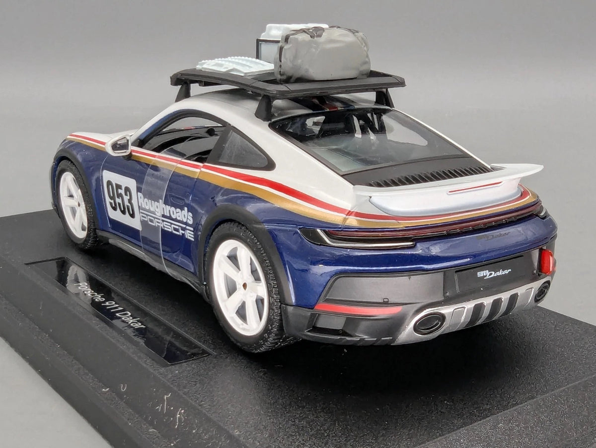 Modellautos 1:24 Bburago Porsche 911 Dakar mit Dealer OVP