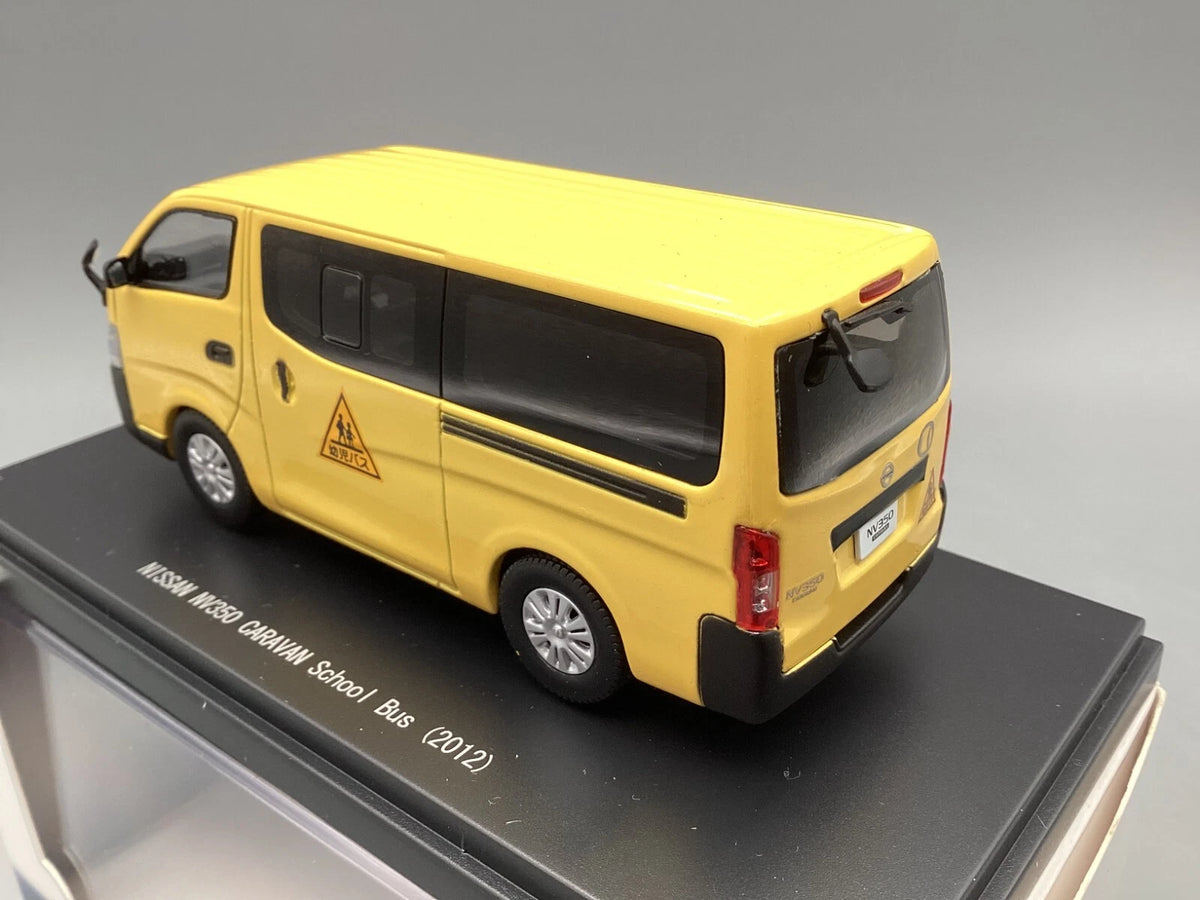 Modellautos 1:43 Ebbro Nissan NV350 Caravan School Bus 2012 in OVP