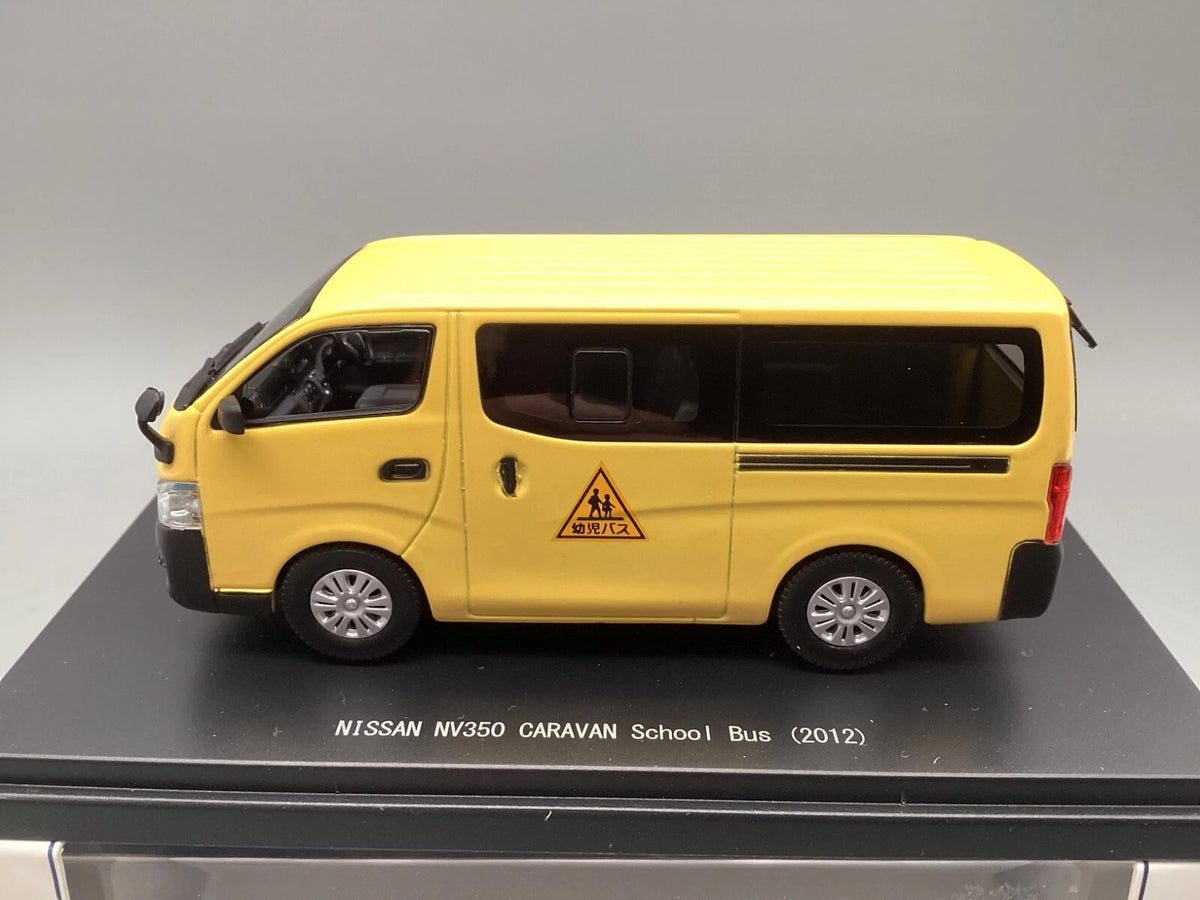 Modellautos 1:43 Ebbro Nissan NV350 Caravan School Bus 2012 in OVP