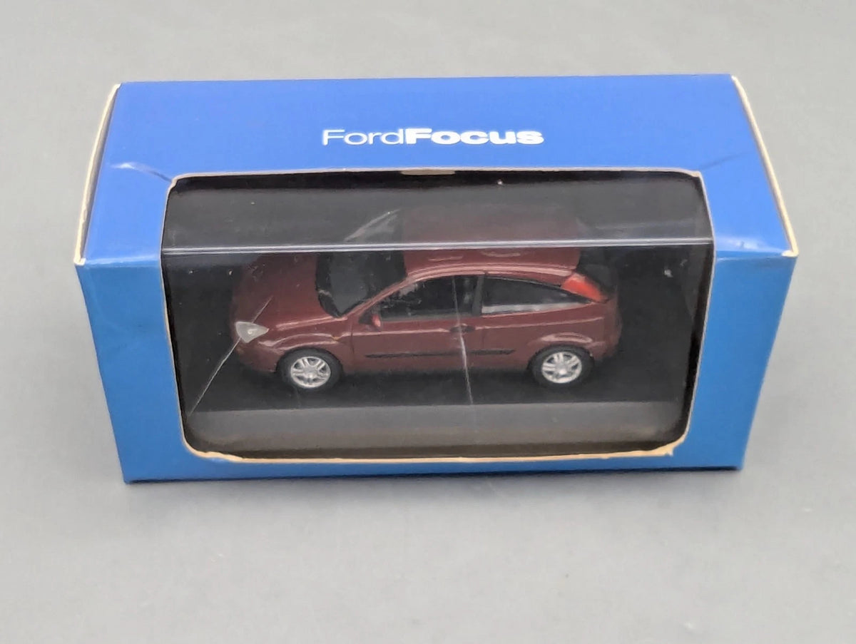 Modellautos 1:43 Minichamps Ford Focus Rot Metallic mit Dealer OVP