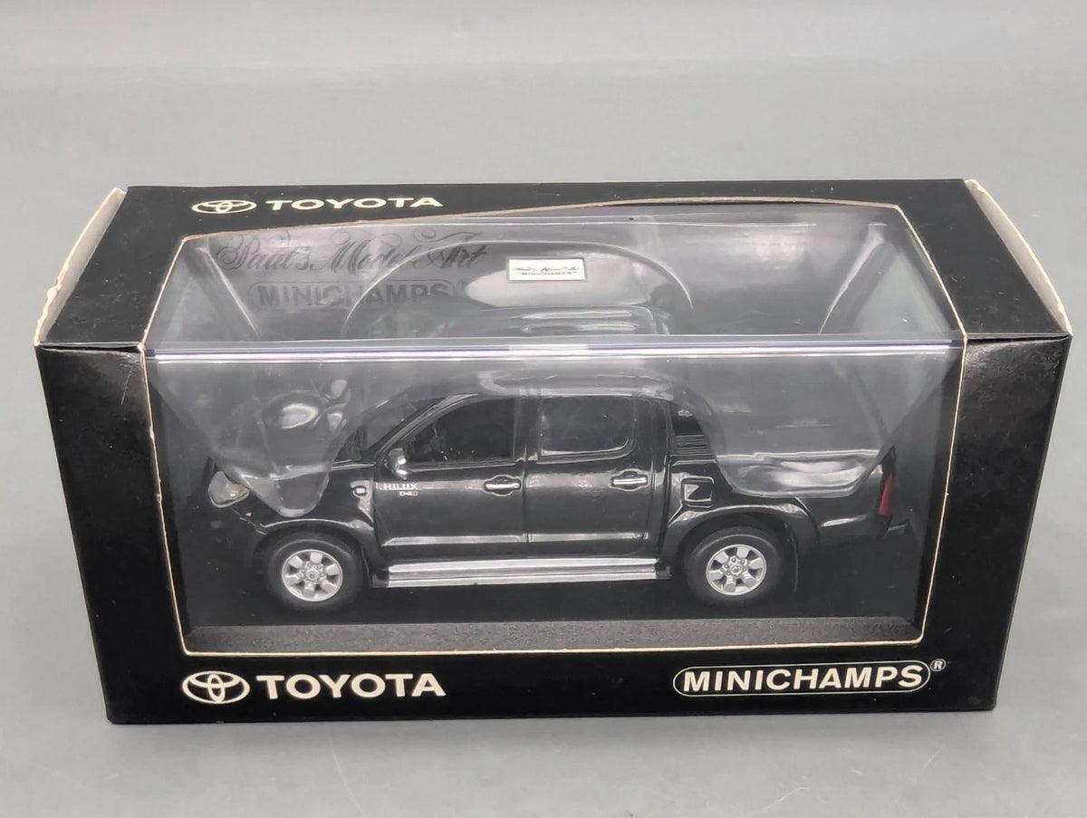Modellautos 1:43 Minichamps Toyota Hillux Schwarz mit OVP