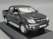 Modellautos 1:43 Minichamps Toyota Hillux Schwarz mit OVP