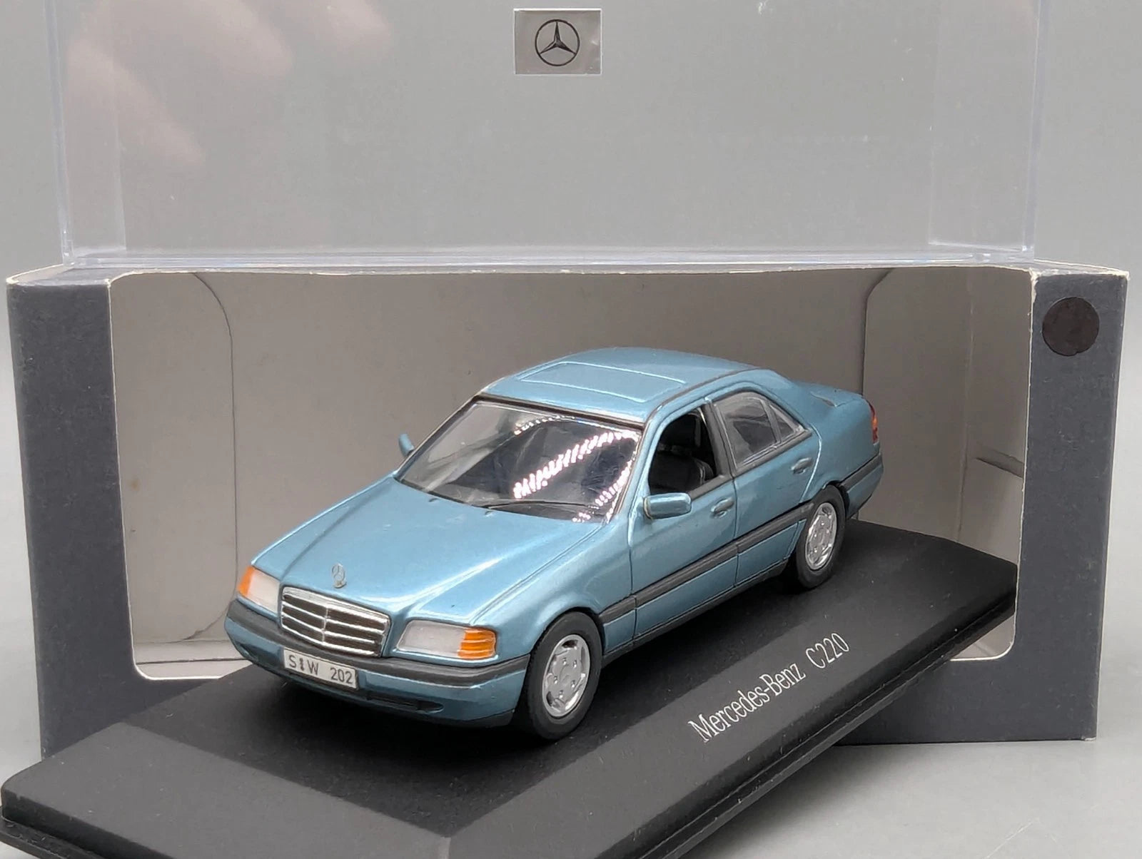 Modellautos 1:43 Minichamps Mercedes Benz C 220 Petrol Metallic mit Dealer OVP