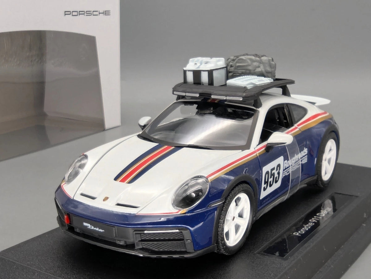 Modellautos 1:24 Bburago Porsche 911 Dakar mit Dealer OVP