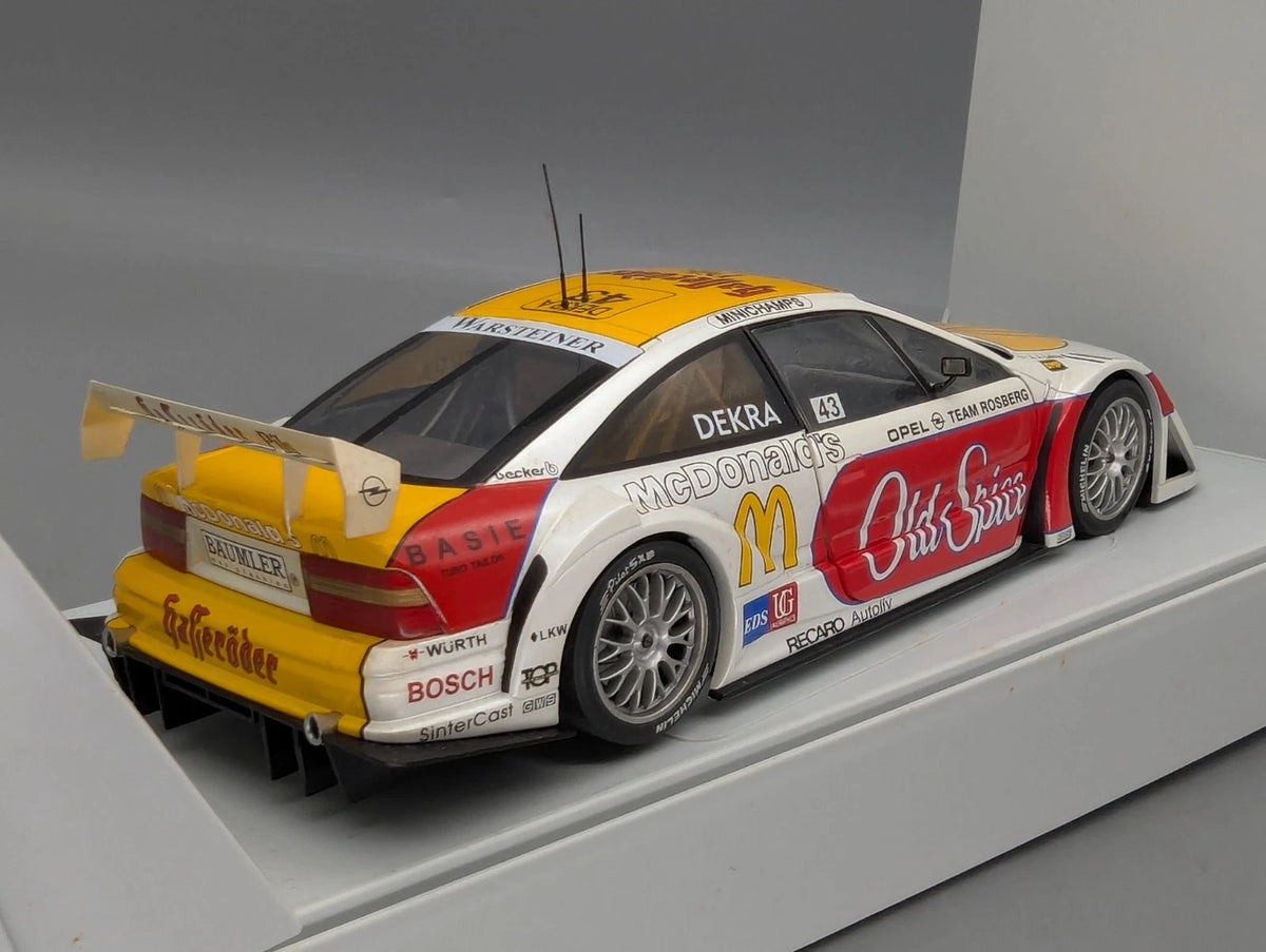 Modellautos 1:18 UT Models Opel Calibra Rosberg 1996 J. J. Letho in OVP