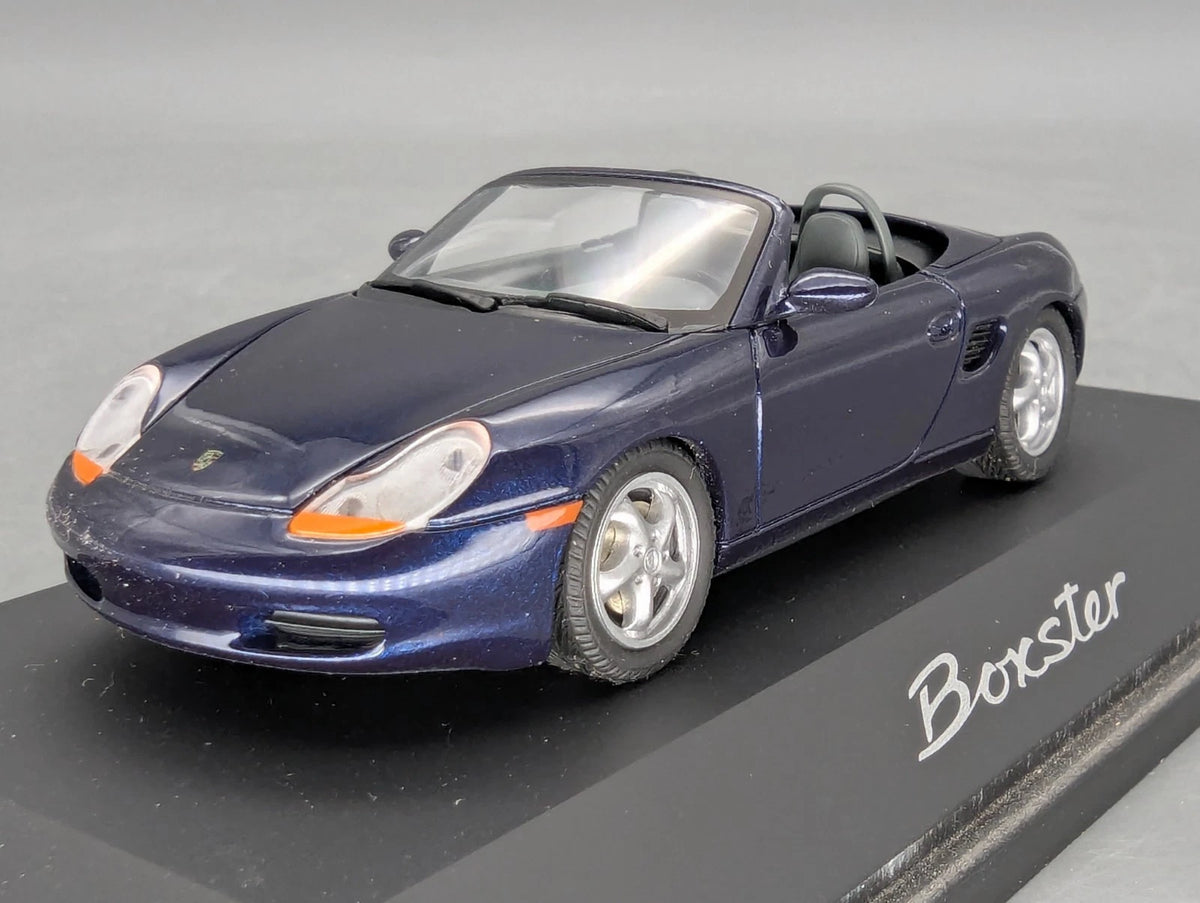 Modellautos 1:43 Schuco Porsche Boxter Blau Metallic mit Vitrine