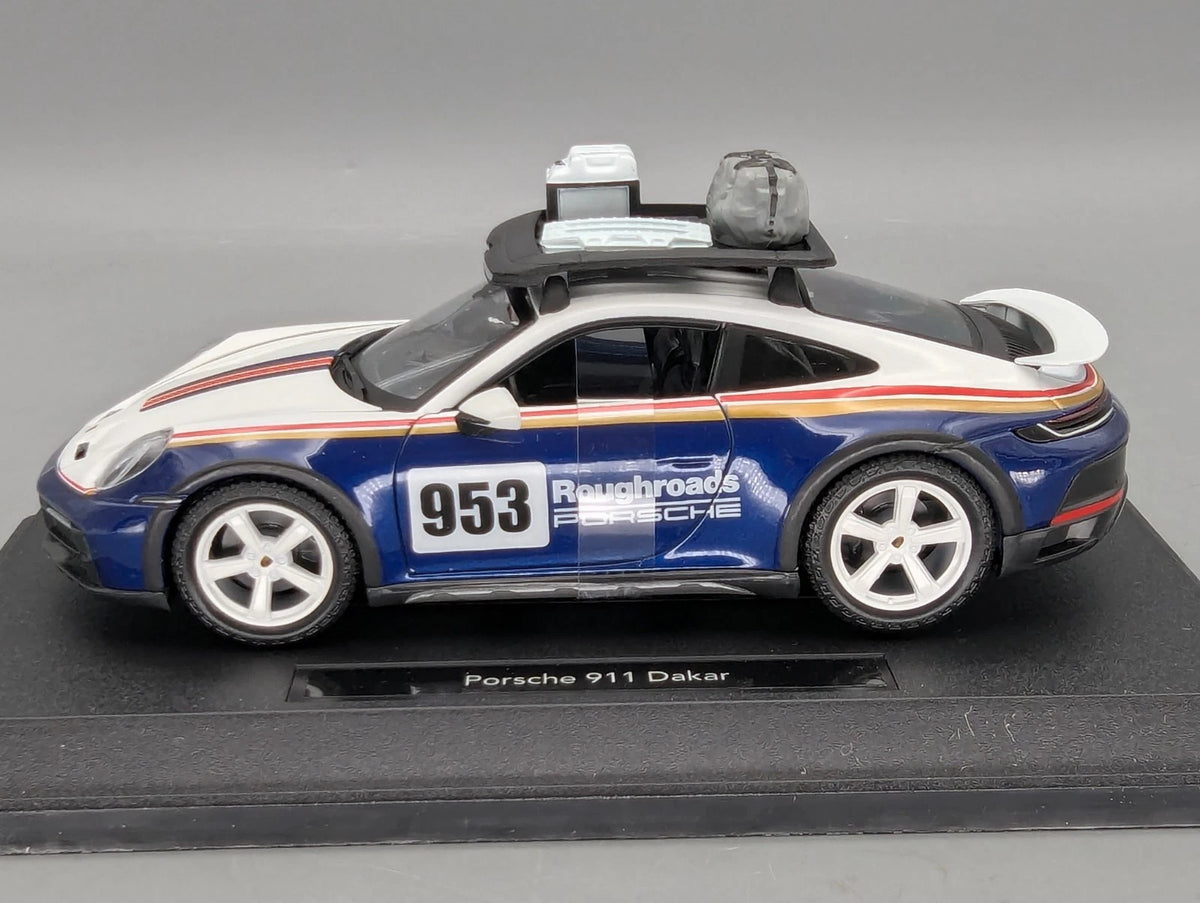 Modellautos 1:24 Bburago Porsche 911 Dakar mit Dealer OVP