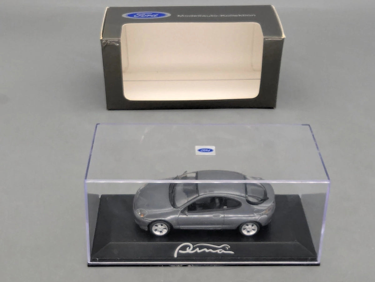Modellautos 1:43 Minichamps Ford Puma Silbergrau Metallic mit Dealer OVP