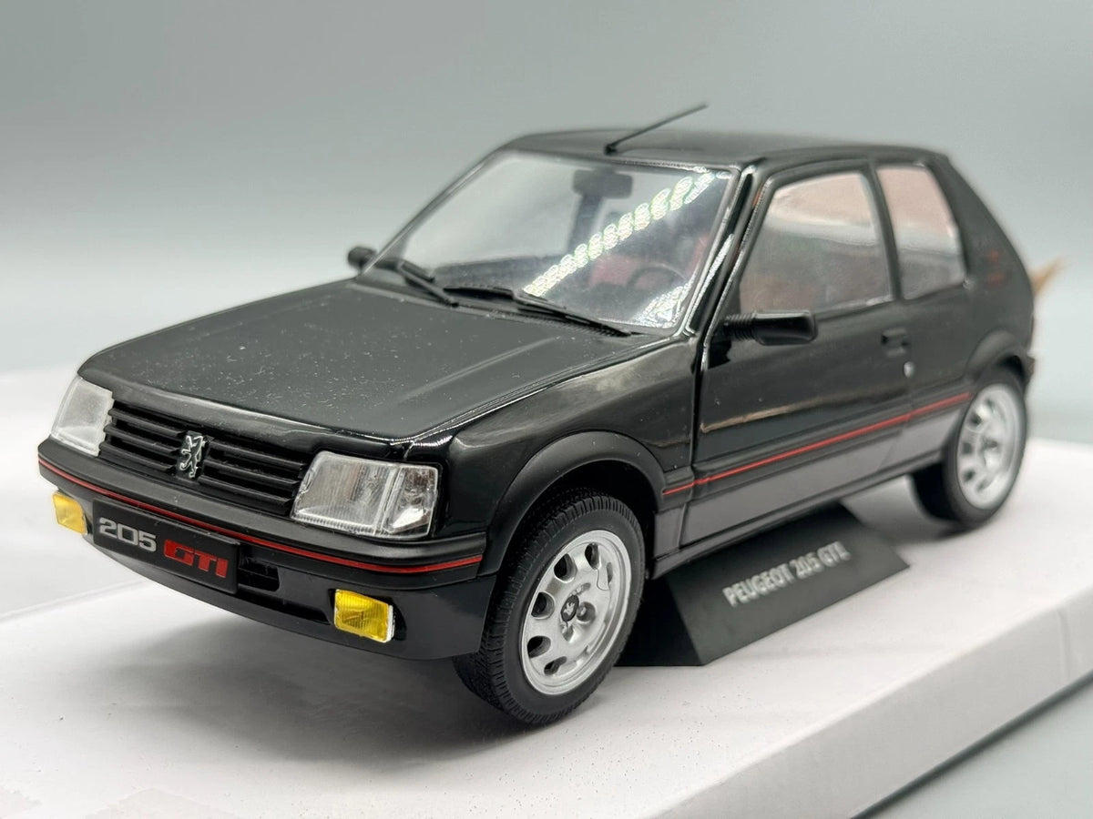 Modellautos 1:18 Solido Peugeot 205 GTI mit OVP