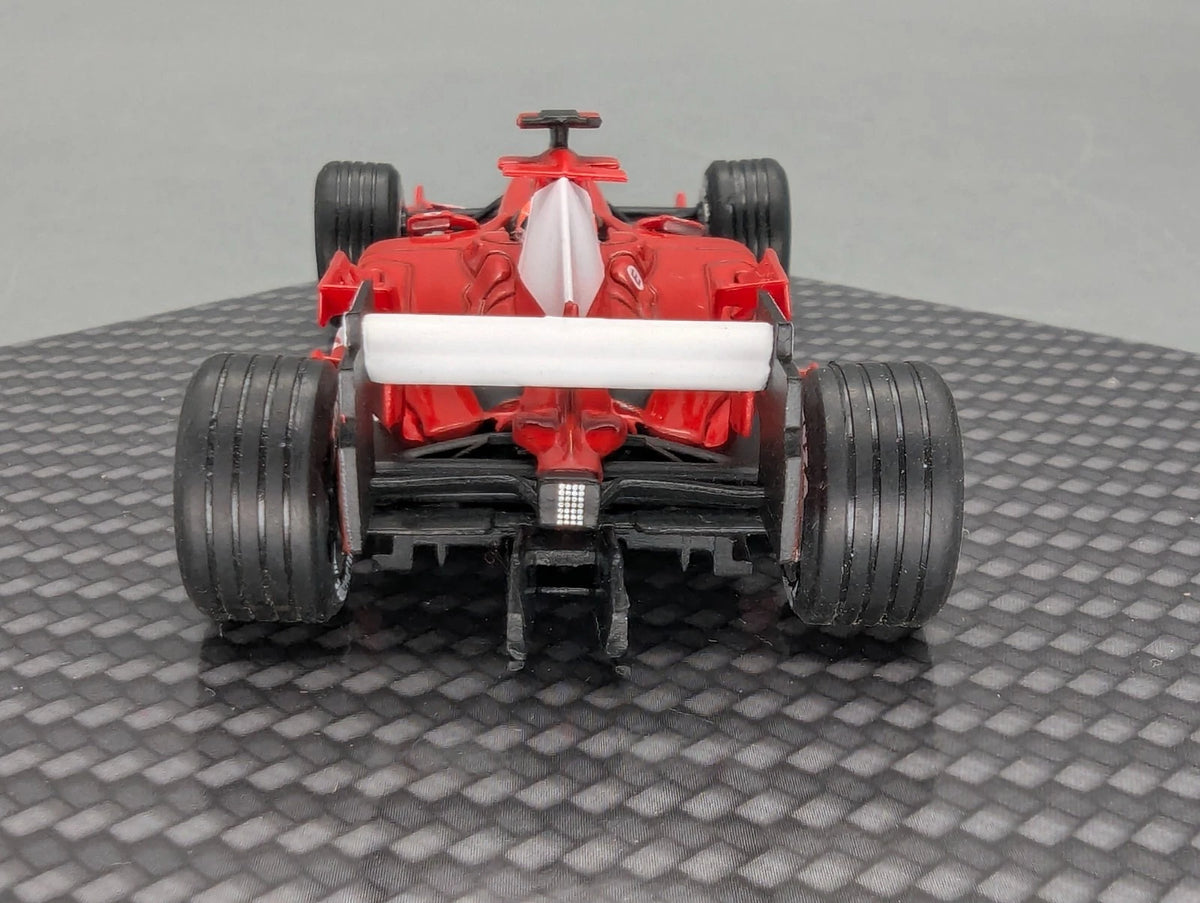 Modellautos 1:43 Ixo Ferrari F2005 #1 Michael Schumacher mit Klappbox OVP