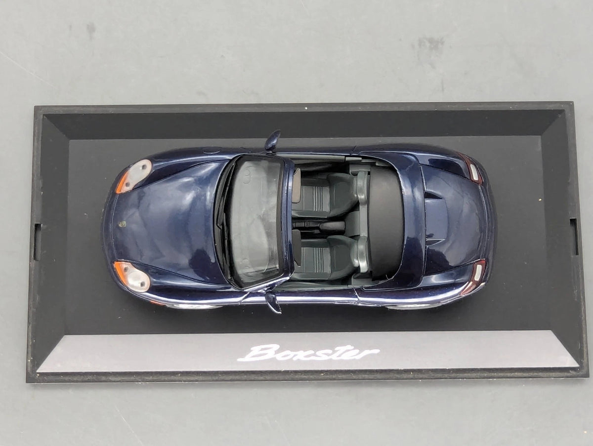 Modellautos 1:43 Schuco Porsche Boxter Blau Metallic mit Vitrine
