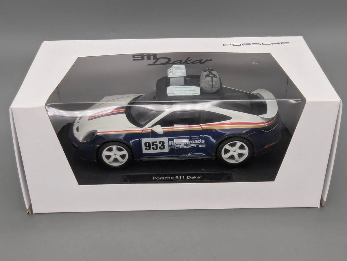 Modellautos 1:24 Bburago Porsche 911 Dakar mit Dealer OVP