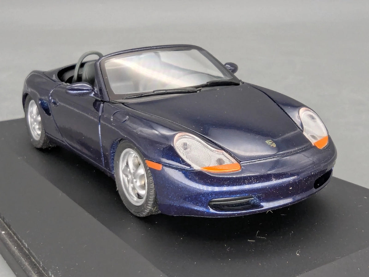Modellautos 1:43 Schuco Porsche Boxter Blau Metallic mit Vitrine